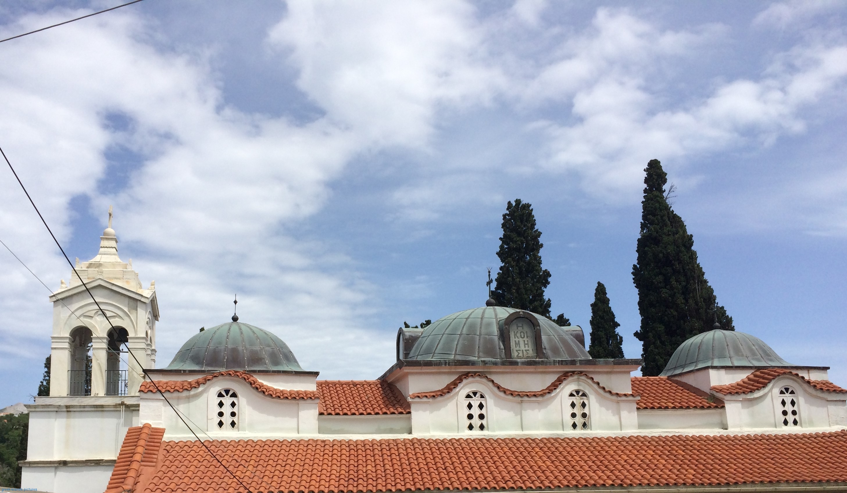 Τhe bell tower and the dome of the church