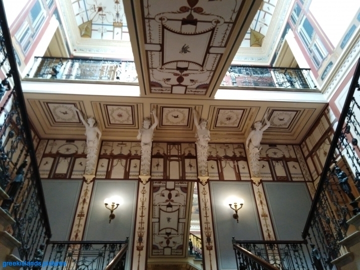 Magnificent views of the ceiling decorations as the visitor goes up the staircases.